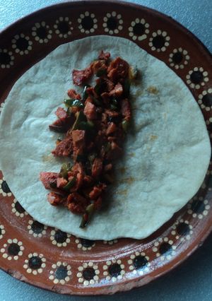 Foto principal de Taco de embutidos y chile poblano a lo ranchero