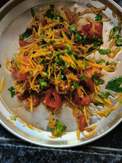 A picture of Carrot tomato salad.
