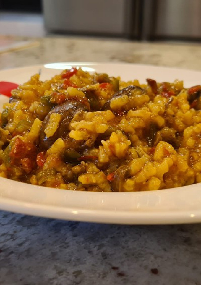 Una foto de Arroz cremoso de rabo de toro y boletus