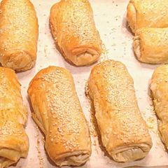 A picture of Mushroom and chicken filo rolls.