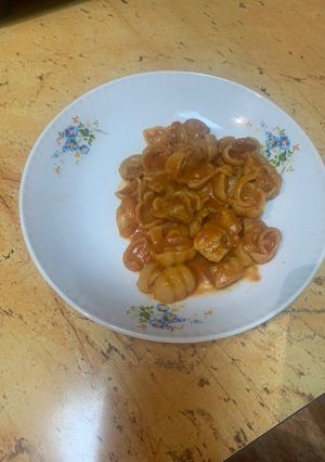O poză a rețetei Paste cu porc în sos de roșii.
