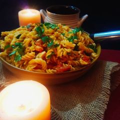 A picture of Pasta with mexican chicken.