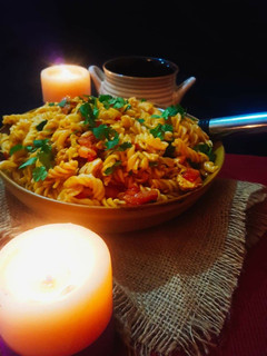 A picture of Pasta with mexican chicken.