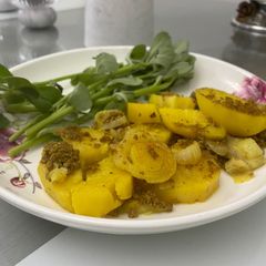 A picture of Potatoes and minced beef.