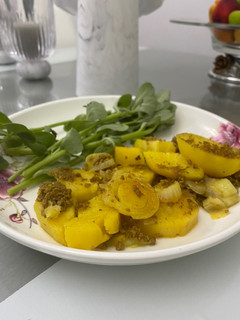 A picture of Potatoes and minced beef.