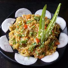 Smoky Baingan Bharta / Eggplant bharta / smoked eggplant mashed A picture of Smoky Baingan Bharta / Eggplant bharta / smoked eggplant mashed.