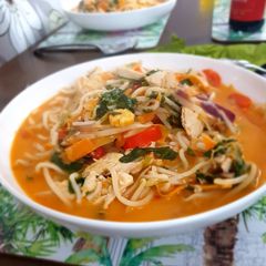 A picture of Red thai ramen.