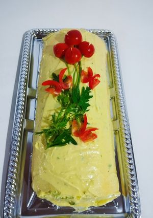 Una foto de Pionono Salado con Jardín Floral