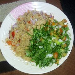 A picture of Couscous with veggies.