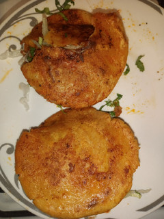 Una foto de Gorditas rellenas de carne de res en chile colorado