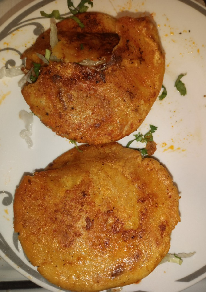 Una foto de Gorditas rellenas de carne de res en chile colorado