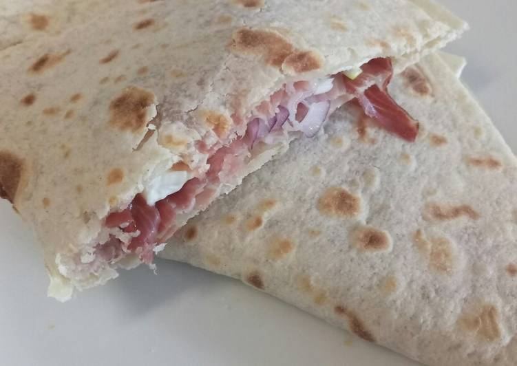 How to Prepare Quick Speck, brie and red onion piadina