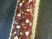 Une photo de entremet chocolat noisette