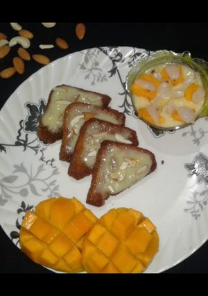 A picture of Shahi tukda with fruit custard.