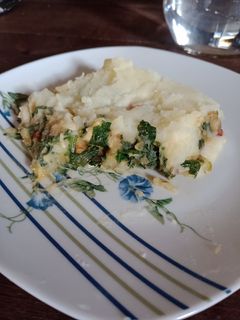 Una foto de Pastel de papa relleno de espinaca