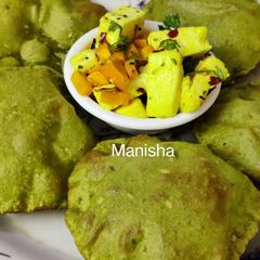 A picture of Palak Puri with Paneer & Carrots stir fry(Spinach Puri).