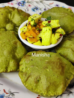 A picture of Palak Puri with Paneer & Carrots stir fry(Spinach Puri).