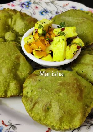 A picture of Palak Puri with Paneer & Carrots stir fry(Spinach Puri).