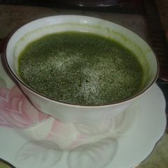 A picture of Curd and spinach soup.