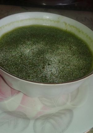 A picture of Curd and spinach soup.
