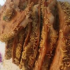 A picture of Mexican taco In Indian style.