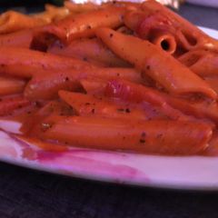 A picture of Red sauce pasta.