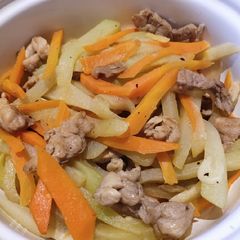A picture of Slices of Pork Sauteed with Carrot and Sayote.