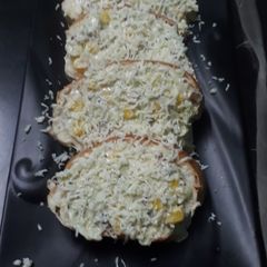 A picture of Cheesy veg open sandwich.