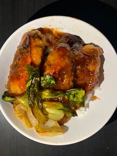 A picture of Asian Chicken over Jasmine Rice and Baby Bok Choy.
