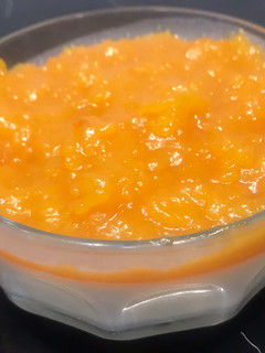 Una foto de Panna-Cotta de naranja