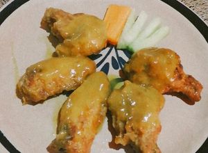 Una foto de Alitas de pollo en salsa habanero con mango. #Freir1