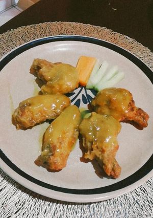 Una foto de Alitas de pollo en salsa habanero con mango. #Freir1