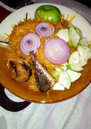 A picture of Abacha with fried fish.