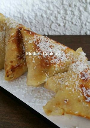 A picture of Pineapple, Chocolate, and Coconut Crepe Samosas.