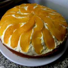 Foto principal de Torta bizcocho de vainilla con duraznos, crema y dulce de leche