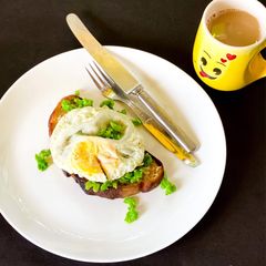 A picture of Poached egg on crushed peas.