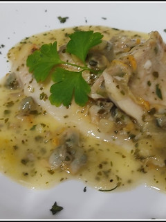Una foto de Filetes de merluza en salsa verde