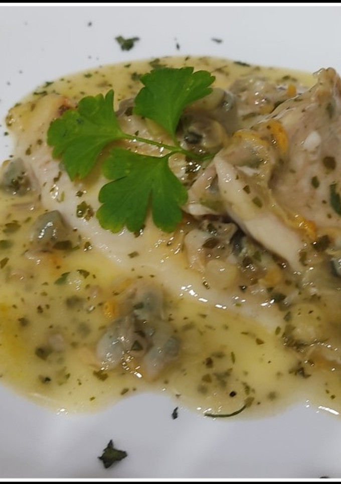 Una foto de Filetes de merluza en salsa verde