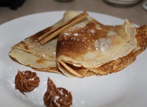 Una foto de Crepês dulces rellenos
