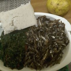 Dry fried Omena, and Kales with Ugali A picture of Dry fried Omena, and Kales with Ugali.
