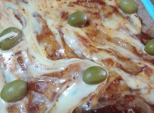 Una foto de Pizza integral