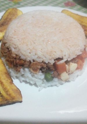 Una foto de Arroz tapado