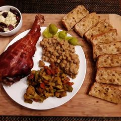 A picture of Smoked Turkey Leg with Chickpeas.