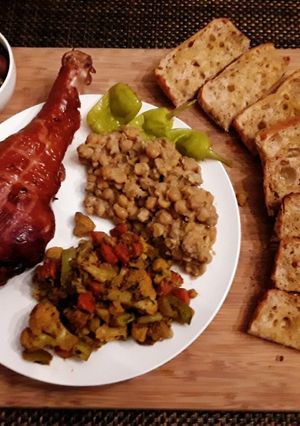 A picture of Smoked Turkey Leg with Chickpeas.