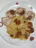 Rôti relleno de ciruelas y piñones con arroz con frutos secos