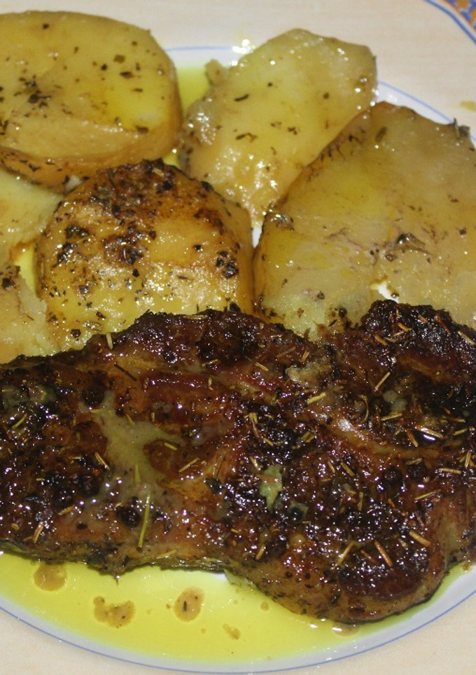 Una foto de Chuletas de cabeza de cerdo especiadas al horno