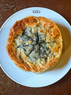 Una foto de Spanakopita (empanada de espinacas)