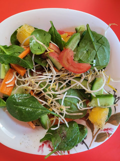 A picture of Sweet sour baby spinach salad.