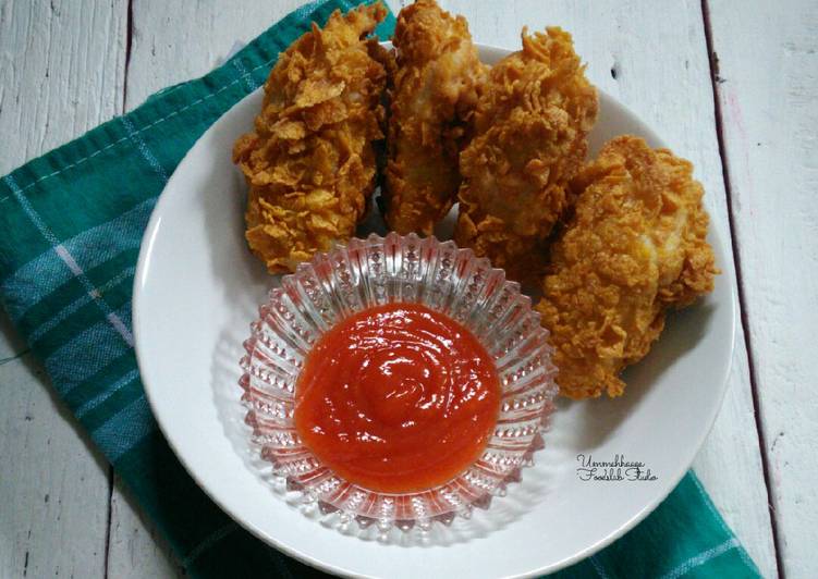 Bagaimana Membuat Tahu cornflakes yang Menggugah Selera