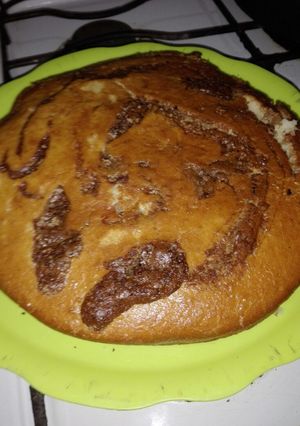 Una foto de Bizcochuelo marmolado de naranja